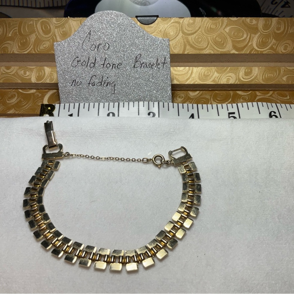 Coro vintage link bracelet with chain in gold tone